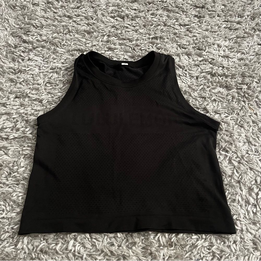 Lululemon black cropped train tank size 4